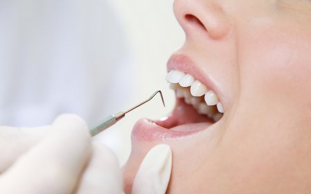 Трепанация коронки зуба в Германии